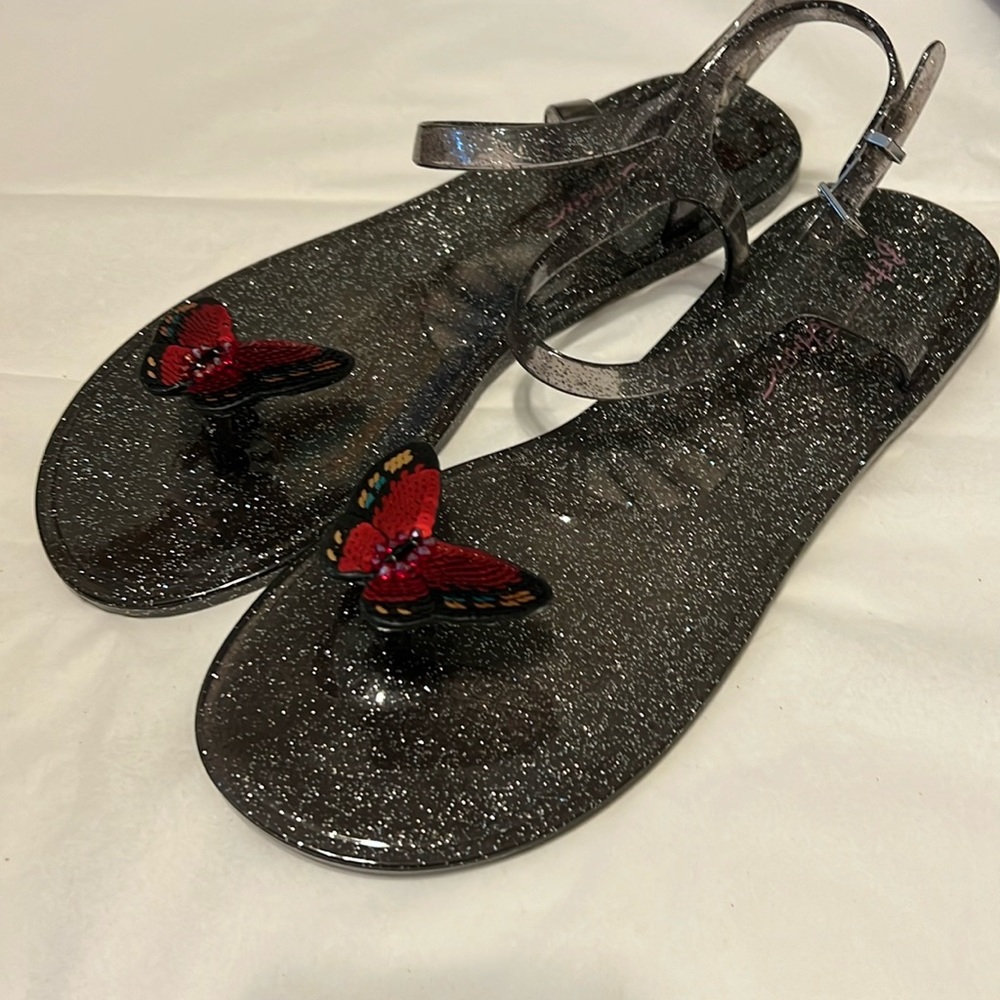 Betsey Johnson Black Glitter Jelly Sandals with Red Butterfly Accent